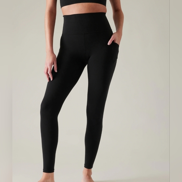 ATHLETA Salutation Stash Tight - Picture 1 of 3